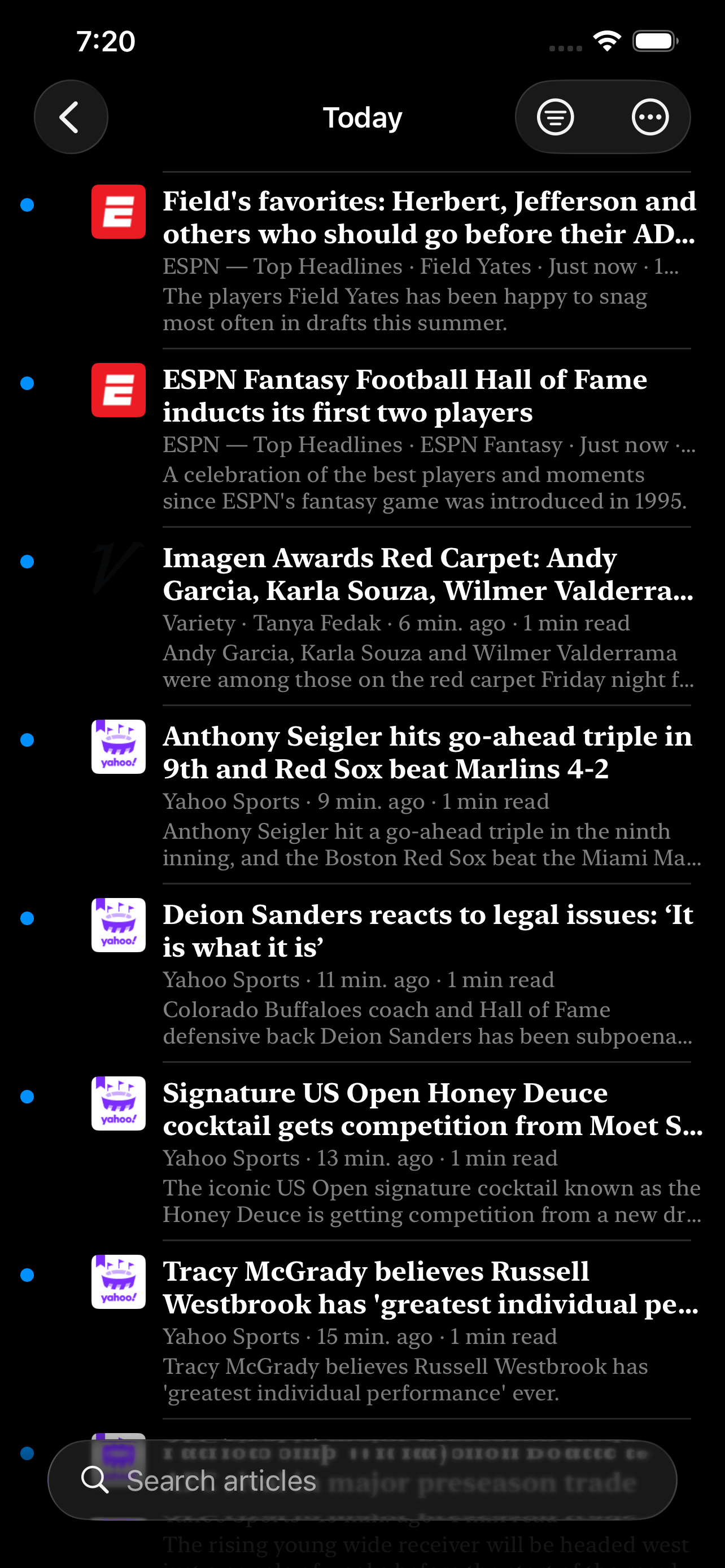 Today on iPhone &mdash; articles from ESPN, Variety and Yahoo Sports in one list, each with its source, byline, age and reading time and the first lines of the piece, unread ones marked with a dot, over a search field