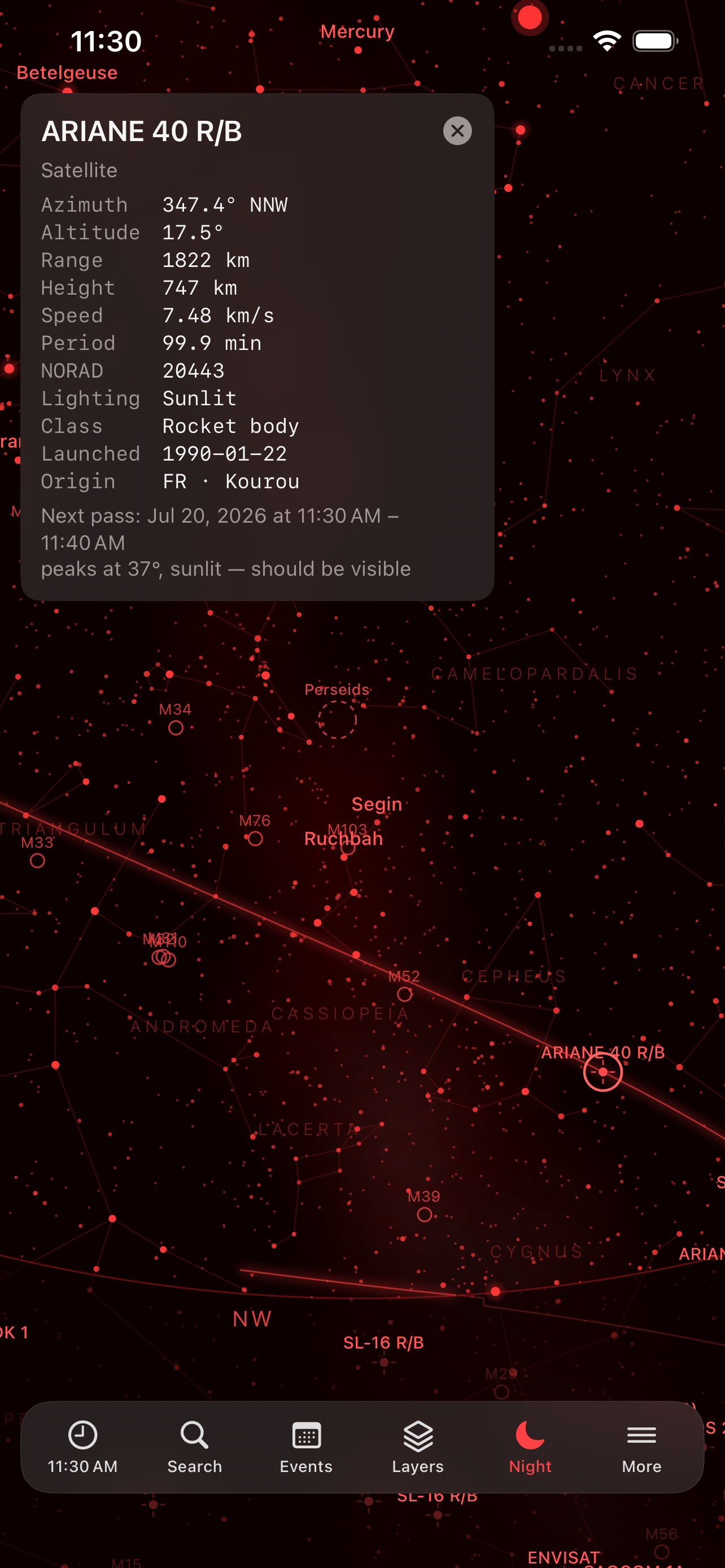 Night mode on iPhone &mdash; the whole chart in red so it will not spoil dark adaptation, with a rocket body from a 1990 Ariane launch selected: azimuth 347.4&deg; NNW, altitude 17.5&deg;, range 1822 km, height 747 km, speed 7.48 km/s, period 99.9 min, NORAD 20443, sunlit, and a next pass peaking at 37&deg; that should be visible